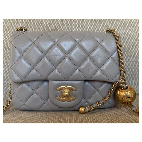 chanel grey pearl crush|Chanel mini flap bag outfit.